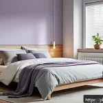 Home 22 집중력 향상에 도움이 되는 수면 습관 - A cozy modern bedroom optimized for better sleep, featuring a firm mattress on a wooden bed frame, b...